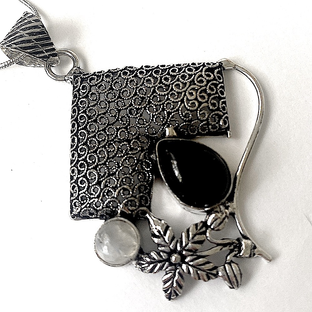 2 inch black onyx and Moonstone , pendant on 925 marked 24 inch chain